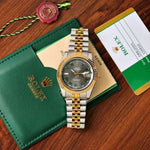 Rolex Oyster Perpetual Date Just Silver Gold