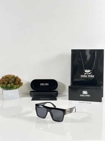 Miu Miu Black Gold
