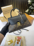 Louis Vuitton Madeleine Top Handle Bag