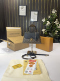 Louis Vuitton Madeleine Top Handle Bag
