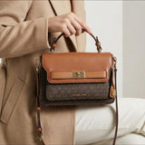 Michael Korrs Kelly Top Handle Bag