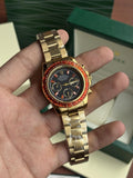 Rolex Oyster Perpetual Cosmograph Gold Black Red Diamond